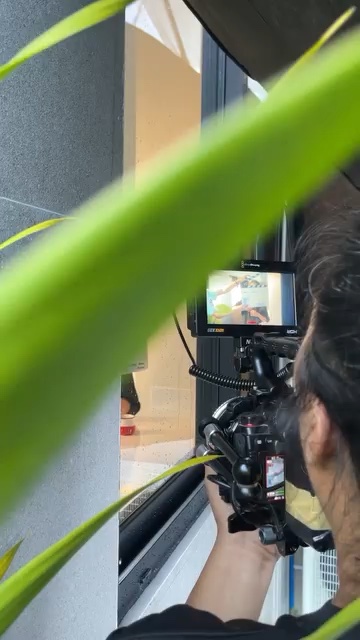 Behind the scenes of a video shoot